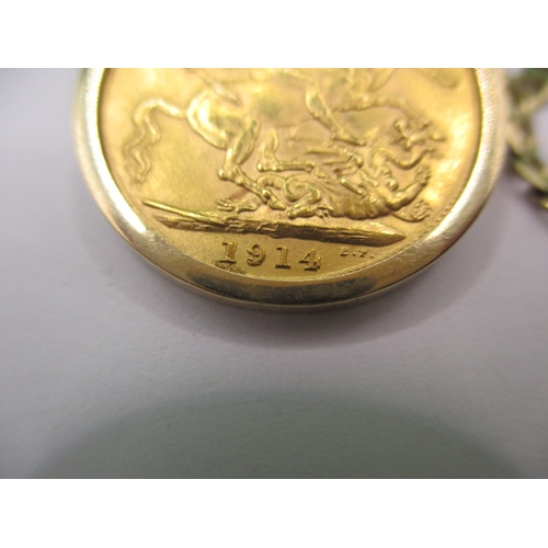 94 - A George V gold sovereign dated 1914 in loose fit coin mount and 9ct gold necklace chain, approx. gr... 