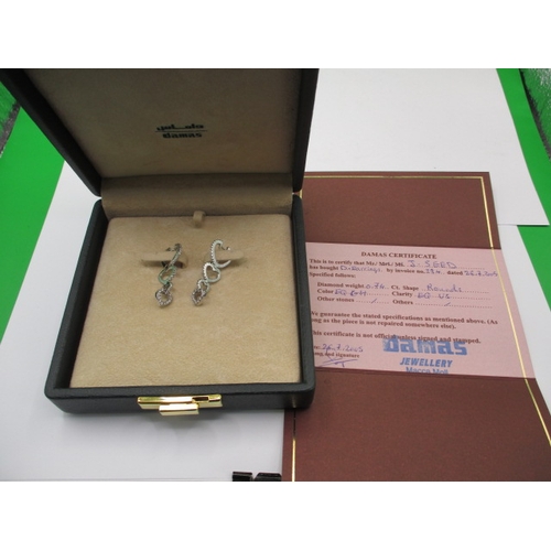 46 - A pair of 18ct white gold and diamond earrings with certificate, approx. 0.74 total diamond weight, ... 