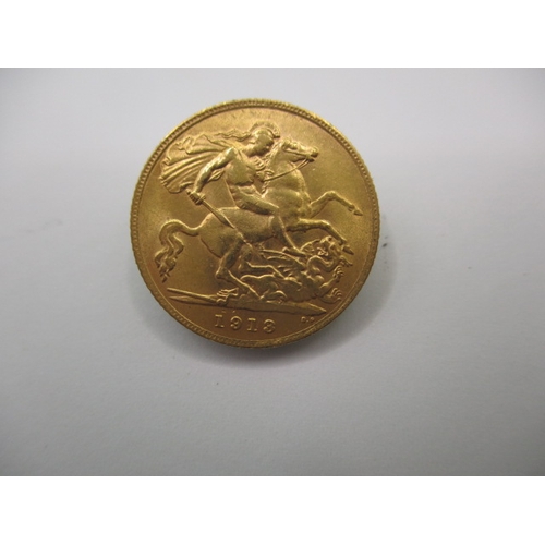 95 - A George V gold half sovereign dated 1913, a circulated coin with very fine definition of features