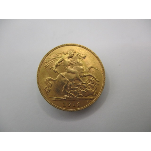 96 - A George V gold half sovereign dated 1913, a circulated coin with very fine definition of features