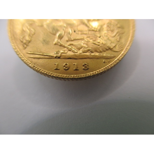 96 - A George V gold half sovereign dated 1913, a circulated coin with very fine definition of features