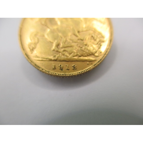 97 - A George V gold half sovereign dated 1913, a circulated coin with very fine definition of features