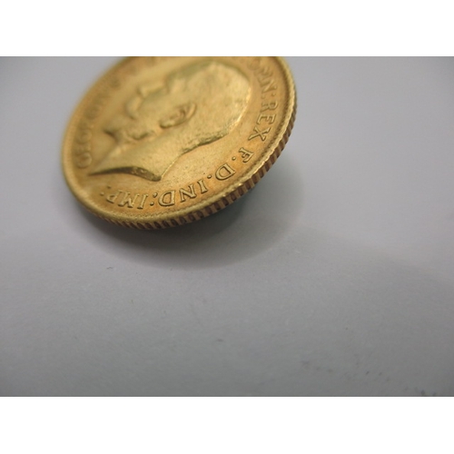 99 - A George V gold half sovereign dated 1914, a circulated coin with very fine definition of features