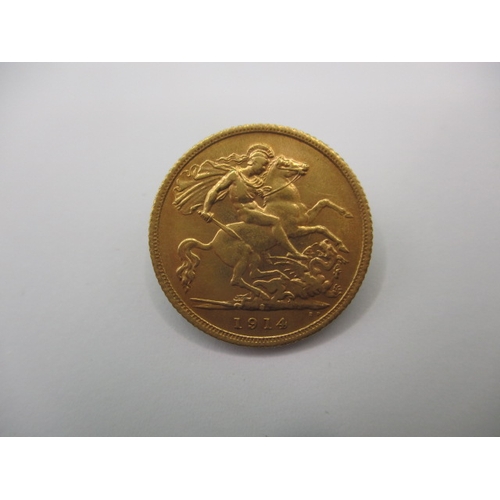 99 - A George V gold half sovereign dated 1914, a circulated coin with very fine definition of features