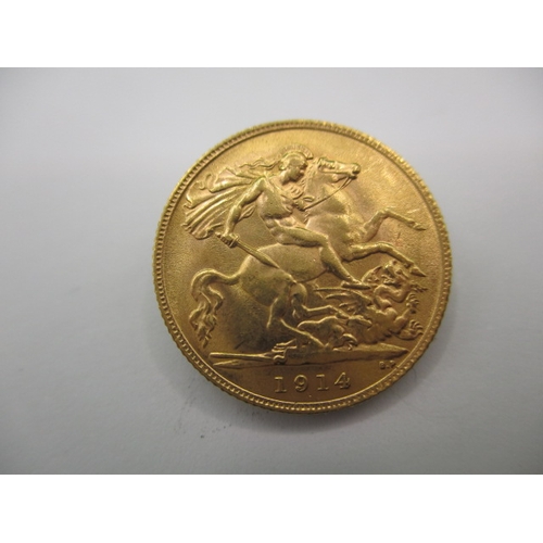 100 - A George V gold half sovereign dated 1914, a circulated coin with very fine definition of features