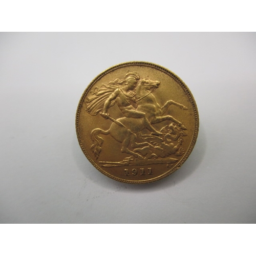 102 - A George V gold half sovereign dated 1911, a circulated coin with very fine definition of features