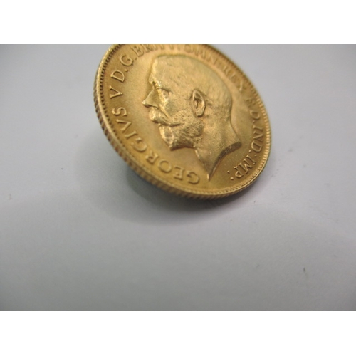 103 - A George V gold half sovereign dated 1911, a circulated coin with very fine definition of features