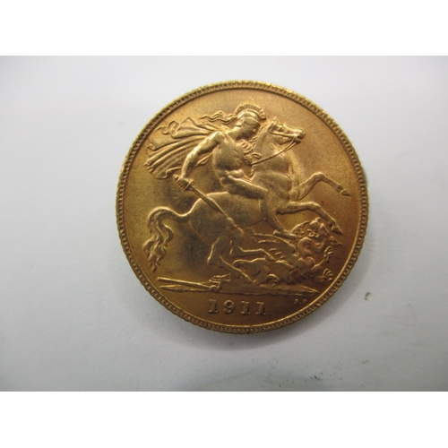 103 - A George V gold half sovereign dated 1911, a circulated coin with very fine definition of features