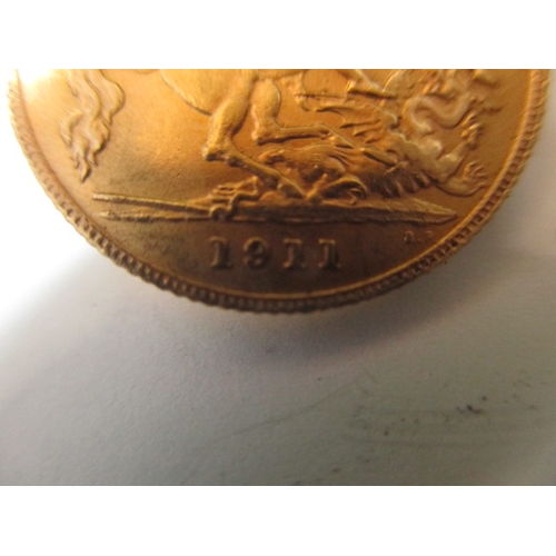 103 - A George V gold half sovereign dated 1911, a circulated coin with very fine definition of features