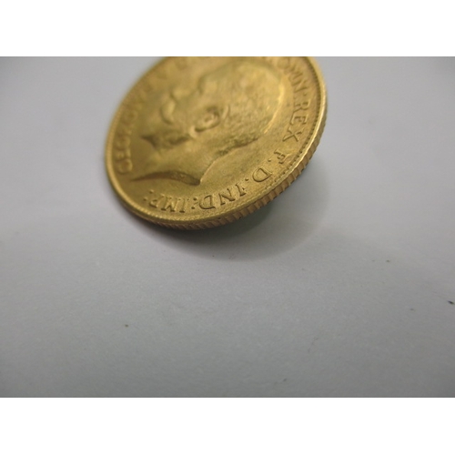 104 - A George V gold half sovereign dated 1912, a circulated coin with very fine definition of features