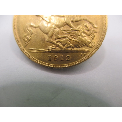 104 - A George V gold half sovereign dated 1912, a circulated coin with very fine definition of features