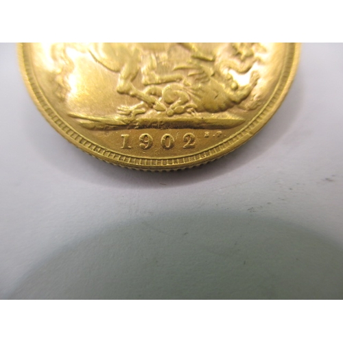 105 - An Edward VII full gold sovereign dated 1902, a circulated coin with fine definition of features