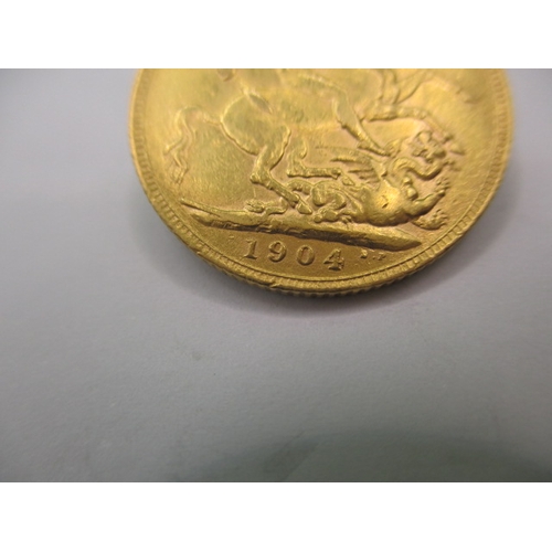 106 - An Edward VII full gold sovereign dated 1904, a circulated coin with fine definition of features