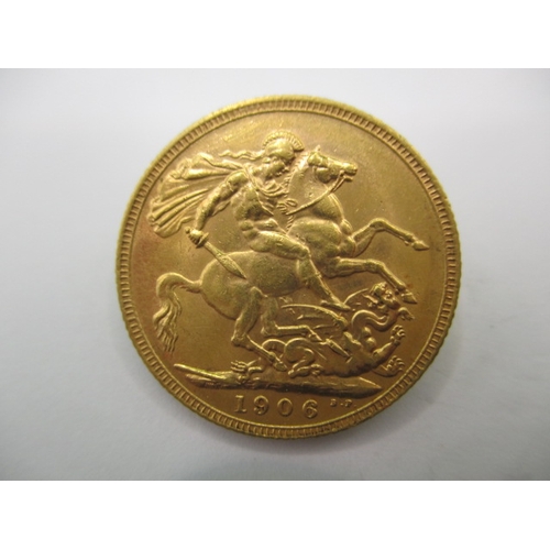 107 - An Edward VII full gold sovereign dated 1906, a circulated coin with fine definition of features