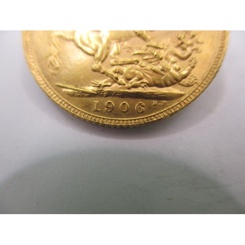 107 - An Edward VII full gold sovereign dated 1906, a circulated coin with fine definition of features