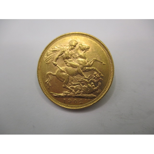 110 - An Edward VII full gold sovereign dated 1902, a circulated coin with fine definition of features