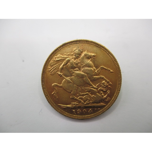 111 - An Edward VII full gold sovereign dated 1904, a circulated coin with fine definition of features