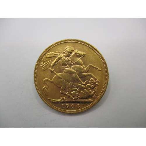 112 - An Edward VII full gold sovereign dated 1906, a circulated coin with fine definition of features