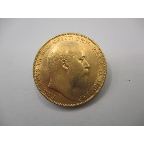 113 - An Edward VII full gold sovereign dated 1909, a circulated coin with very fine definition of feature... 