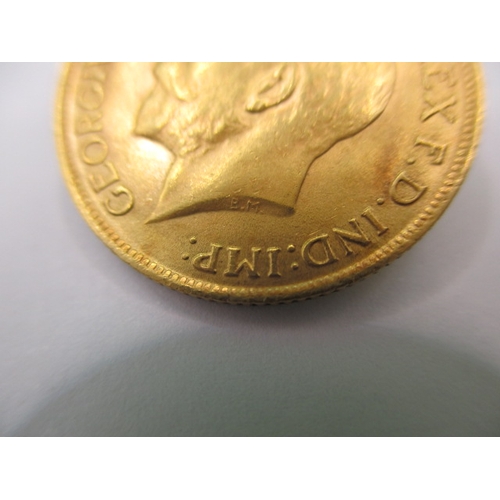 117 - A George V full gold sovereign dated 1913, a circulated coin with very fine definition of features