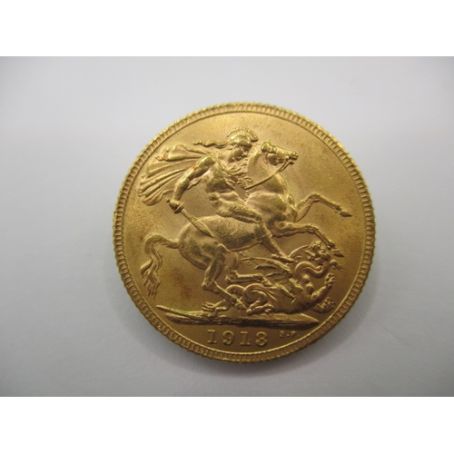 118 - A George V full gold sovereign dated 1913, a circulated coin with very fine definition of features