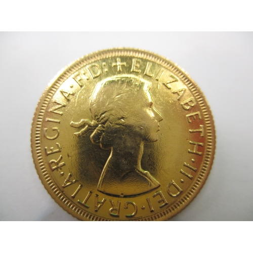 129 - An Elizabeth II  full gold sovereign dated 1966, a circulated coin with very fine definition of feat... 