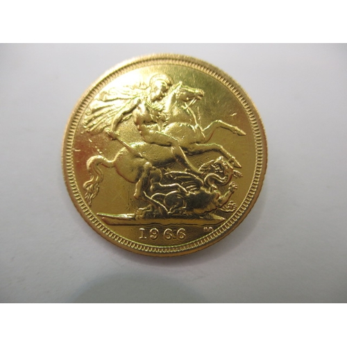 129 - An Elizabeth II  full gold sovereign dated 1966, a circulated coin with very fine definition of feat... 