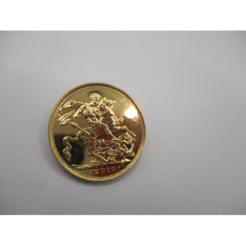 132 - An Elizabeth II  full gold sovereign dated 2010, an uncirculated coin with very fine definition of f... 