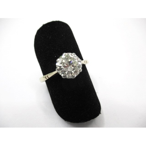 12 - A yellow gold diamond solitaire ring, approx. ring size ‘M’ approx. stone diameter 7mm, unmarked sha... 