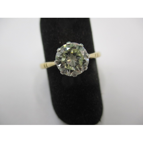 12 - A yellow gold diamond solitaire ring, approx. ring size ‘M’ approx. stone diameter 7mm, unmarked sha... 