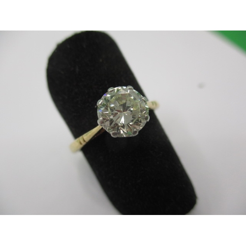 12 - A yellow gold diamond solitaire ring, approx. ring size ‘M’ approx. stone diameter 7mm, unmarked sha... 