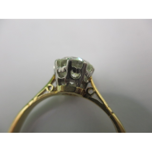 12 - A yellow gold diamond solitaire ring, approx. ring size ‘M’ approx. stone diameter 7mm, unmarked sha... 