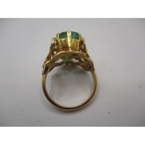 6 - An Asian yellow gold ring with large central green stone, approx. ring size ‘M+’, approx. gross weig... 