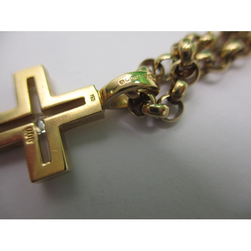 64 - A 9ct yellow gold necklace chain with an 18ct diamond set cross pendant, approx. linear length 60cm,... 