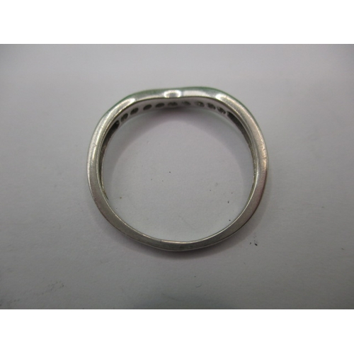 8 - A platinum and diamond half eternity ring, approx. ring size ‘N+’, approx. weight 2.75g in useable p... 