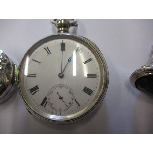 87 - A vintage fine silver cased pocket watch, no key so not tested as to function, a silver pill pot and... 