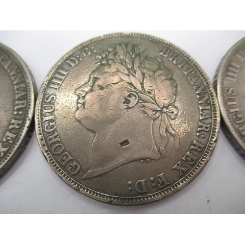 154 - Three George IV silver crowns dated 1821, all circulated with fine definition of features