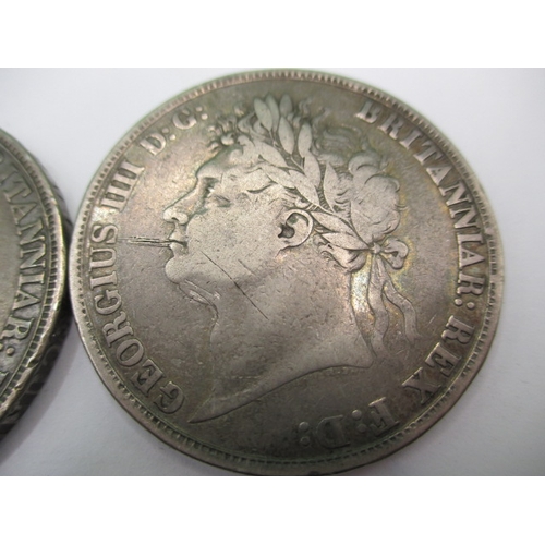 154 - Three George IV silver crowns dated 1821, all circulated with fine definition of features