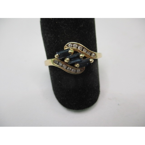 16 - A 9ct yellow gold, diamond and sapphire ring, approx. ring size ‘P’, approx. weight 2g in useable pr... 