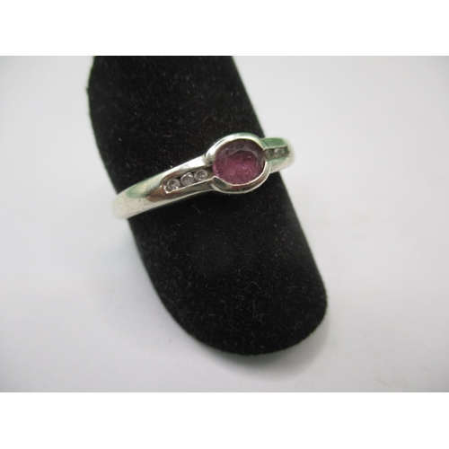 18 - A 9ct white gold and pink sapphire dress ring, approx. ring size ‘Q’ approx. weight 2.1g in useable ... 