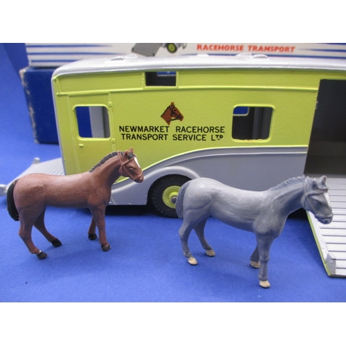 243 - A Dinky Supertoys 979 Racehorse Transporter, with original box and model in near mint condition