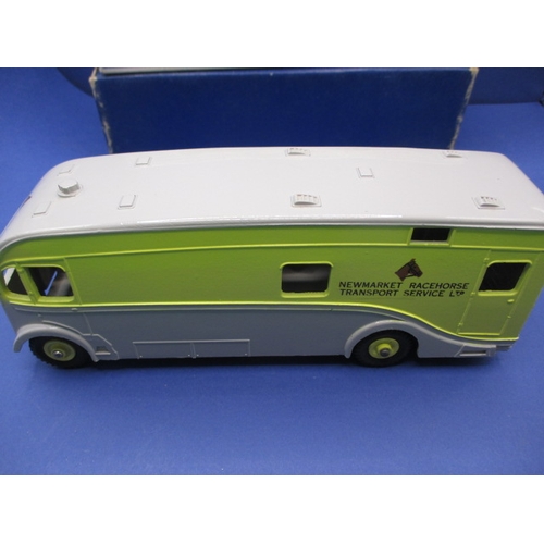 243 - A Dinky Supertoys 979 Racehorse Transporter, with original box and model in near mint condition