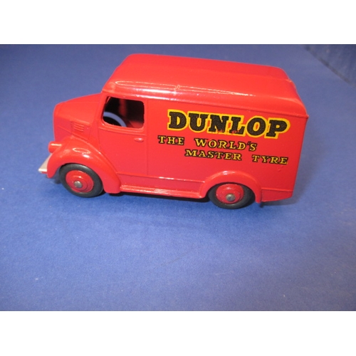 248 - A Dinky Toys 451 Trojan 15 CWT van for Dunlop tyres, with original box which has had flap re-stuck, ... 