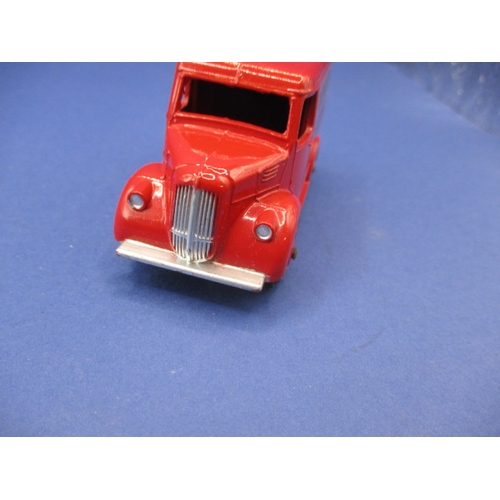 248 - A Dinky Toys 451 Trojan 15 CWT van for Dunlop tyres, with original box which has had flap re-stuck, ... 