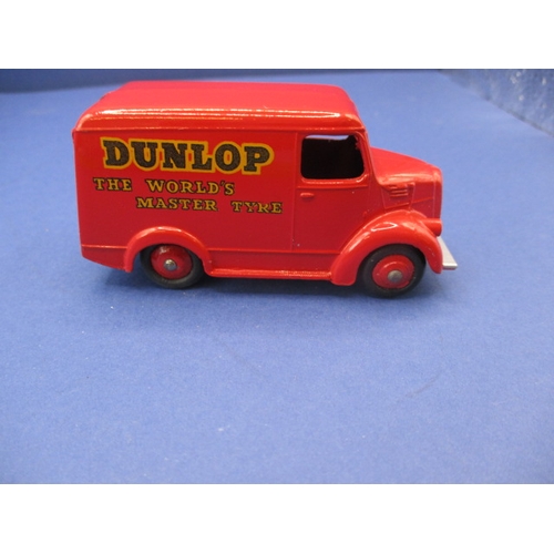 248 - A Dinky Toys 451 Trojan 15 CWT van for Dunlop tyres, with original box which has had flap re-stuck, ... 