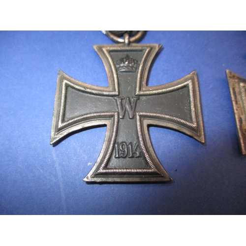 255 - Three German medals to include WWI iron cross WWII iron cross and a Third Reich NSDAP 10 year servic... 