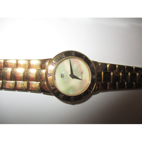 82 - Two designer watches, one by Gucci the other Guess, provenanced by vendor as originally being purcha... 