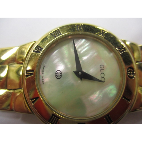 82 - Two designer watches, one by Gucci the other Guess, provenanced by vendor as originally being purcha... 