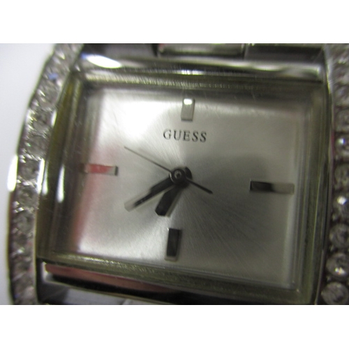 82 - Two designer watches, one by Gucci the other Guess, provenanced by vendor as originally being purcha... 