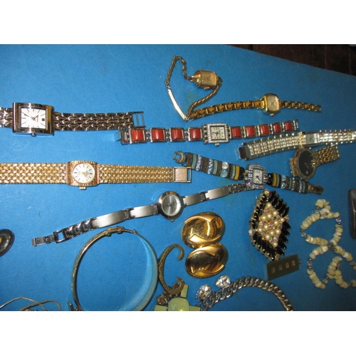 232 - A parcel of vintage costume jewellery and watches, to include some silver and gold items, all in use... 